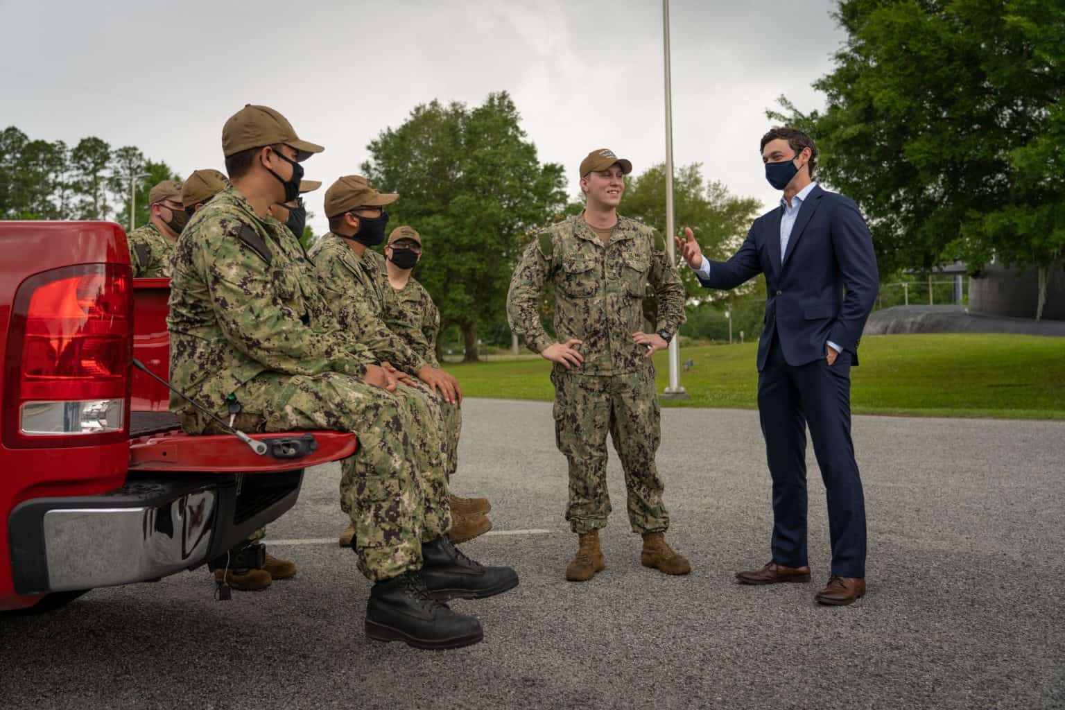 Senator Ossoff having a conversation with uniformed troops at the Kings Bay, Georgia submarine base.