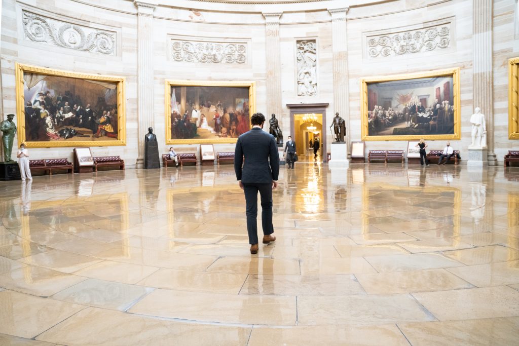 Senator Ossoff from behind walking in the Capitol Rotunda.