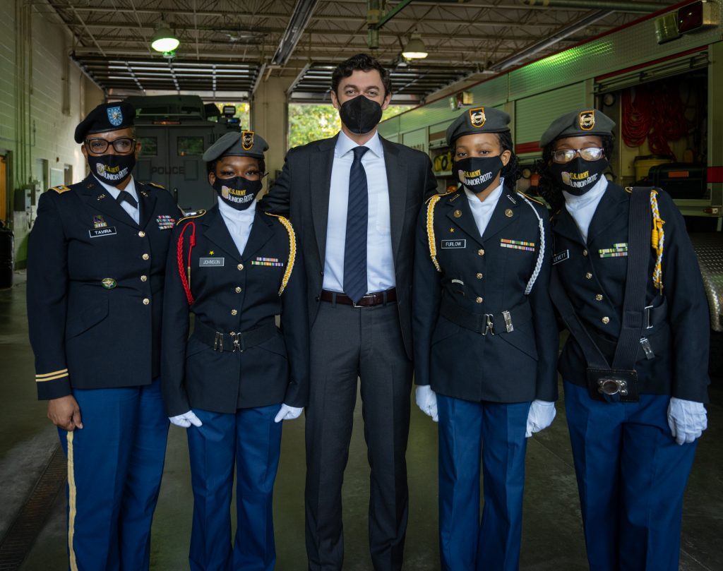 Senator Ossoff, an Army officer, and three Army Junior ROTC members.